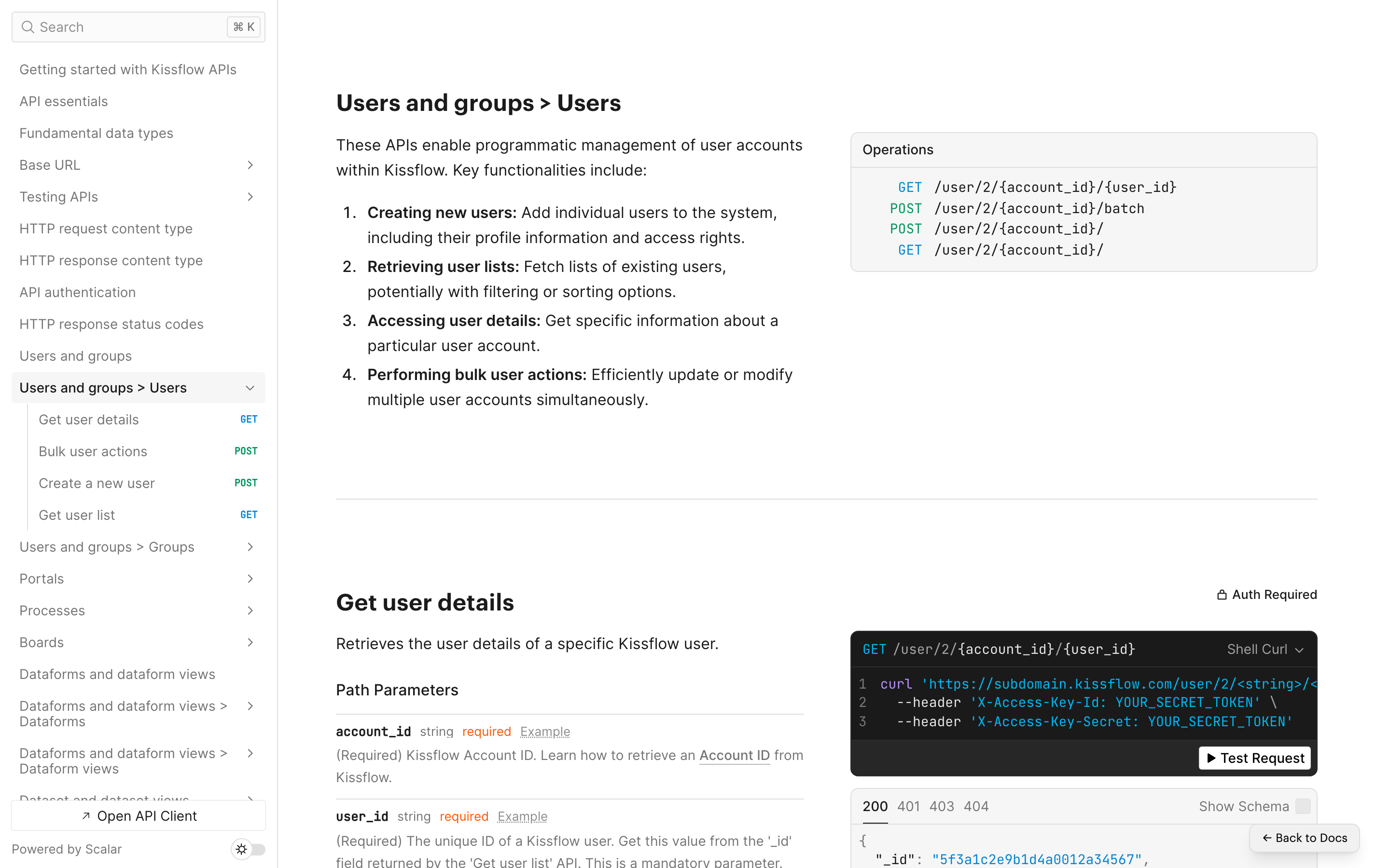 The finished API reference rendered by Scalar: the Users and groups module with a Get user details operation, path parameters, a generated cURL example carrying both access-key headers, and a live Test Request button.
